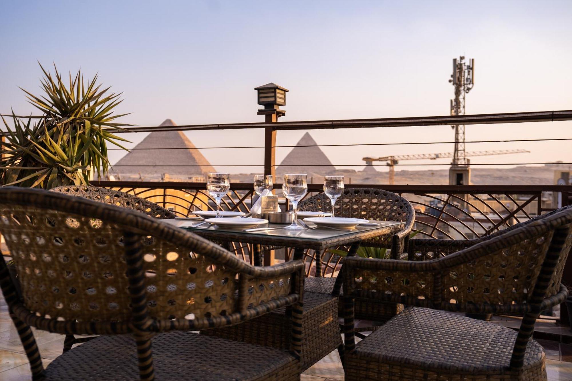 Hotel Pyramids Gem Plaza à Kafret el-Gabal Extérieur photo