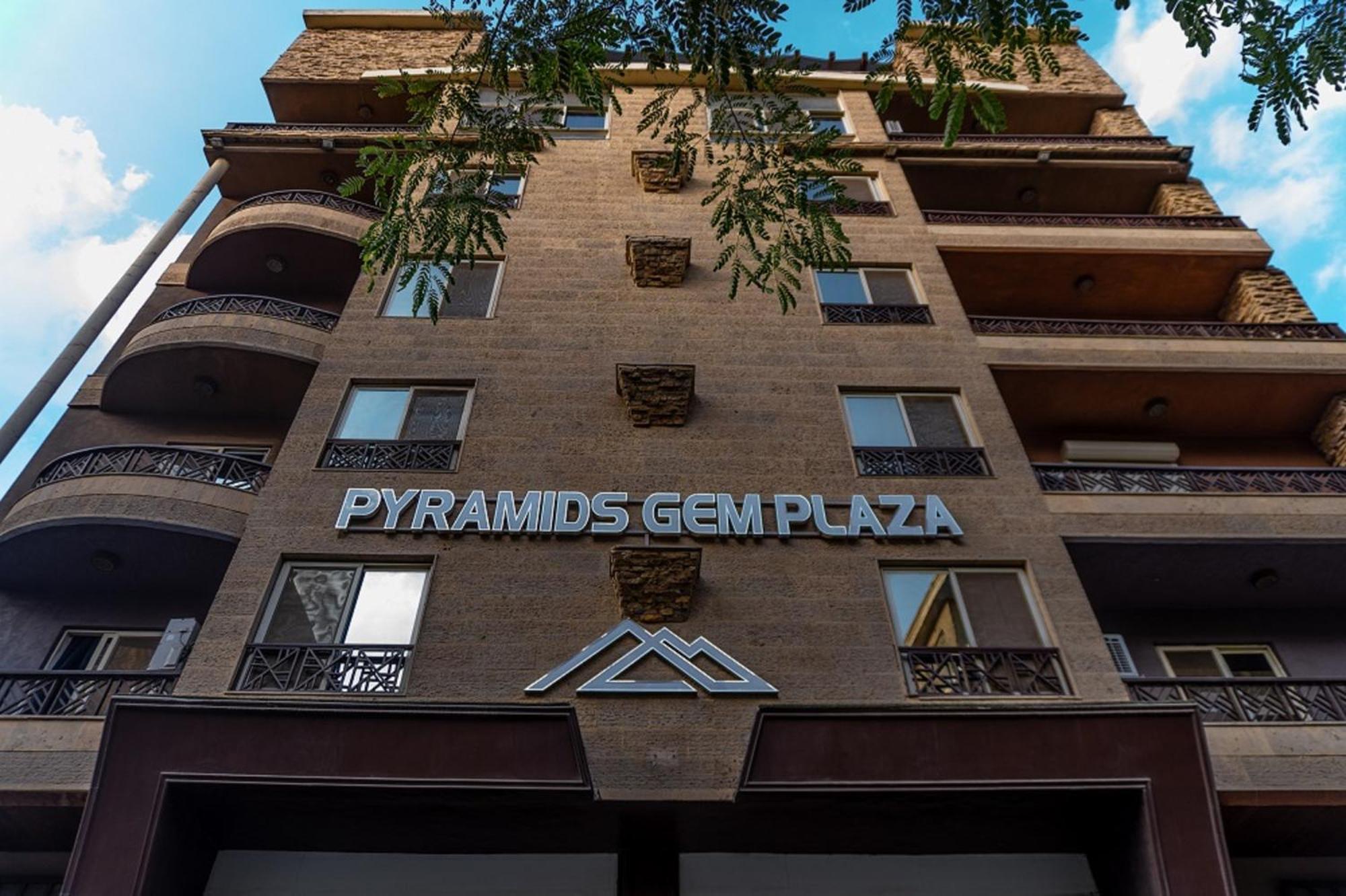 Hotel Pyramids Gem Plaza à Kafret el-Gabal Extérieur photo