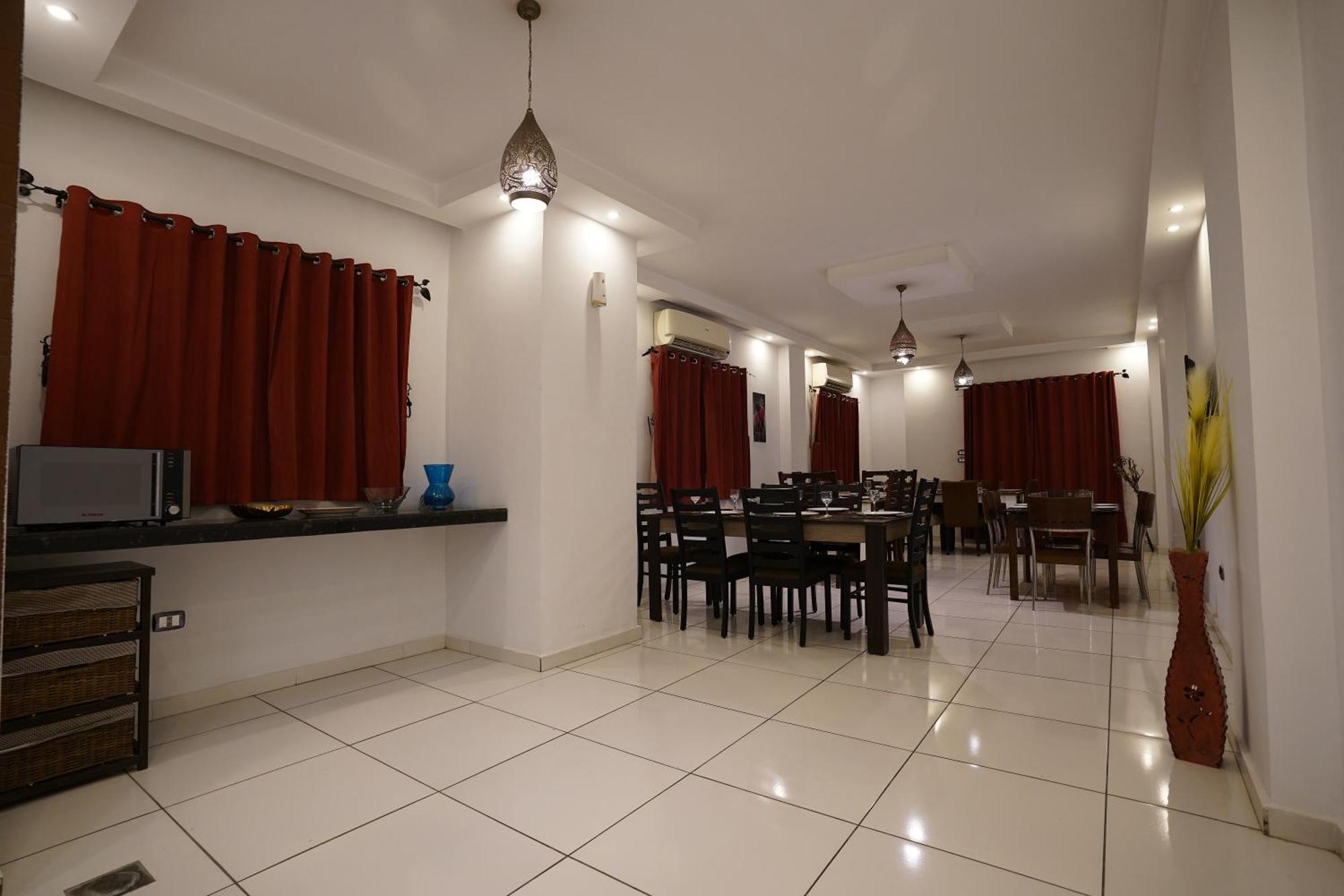Hotel Pyramids Gem Plaza à Kafret el-Gabal Extérieur photo