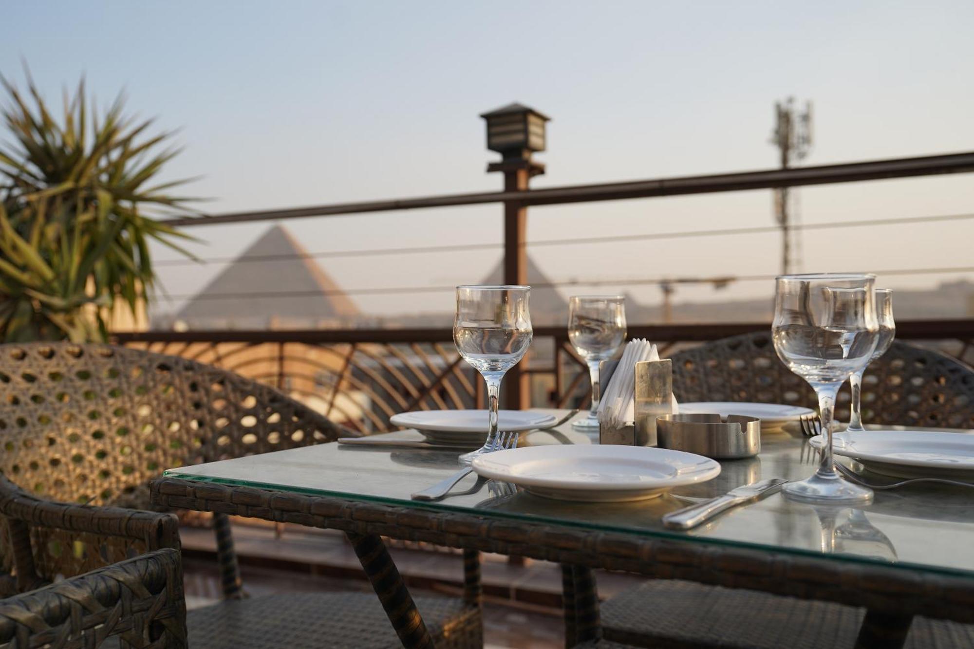 Hotel Pyramids Gem Plaza à Kafret el-Gabal Extérieur photo
