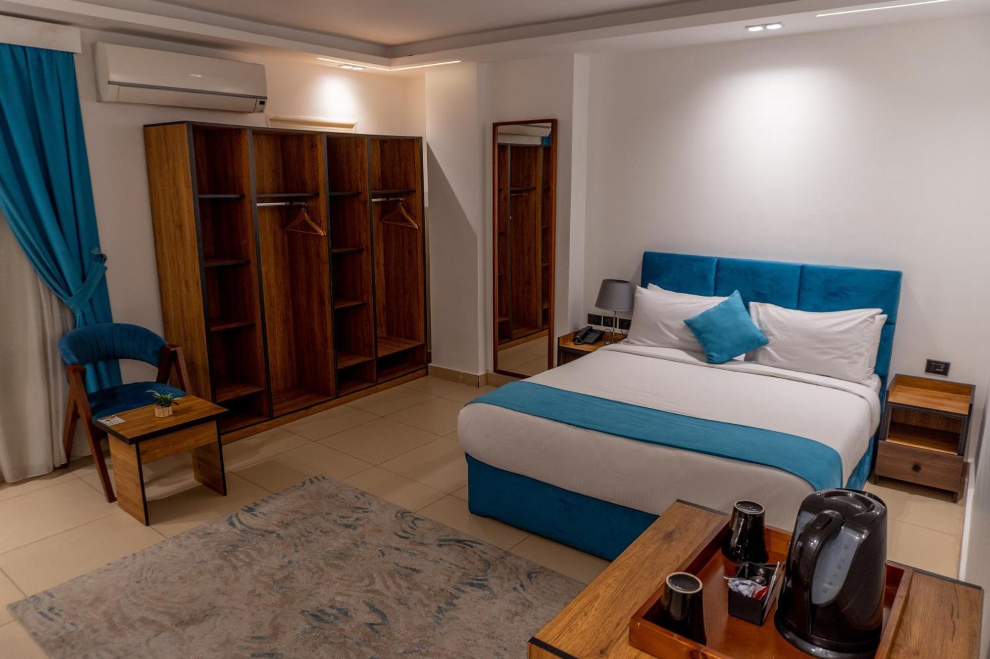 Hotel Pyramids Gem Plaza à Kafret el-Gabal Extérieur photo