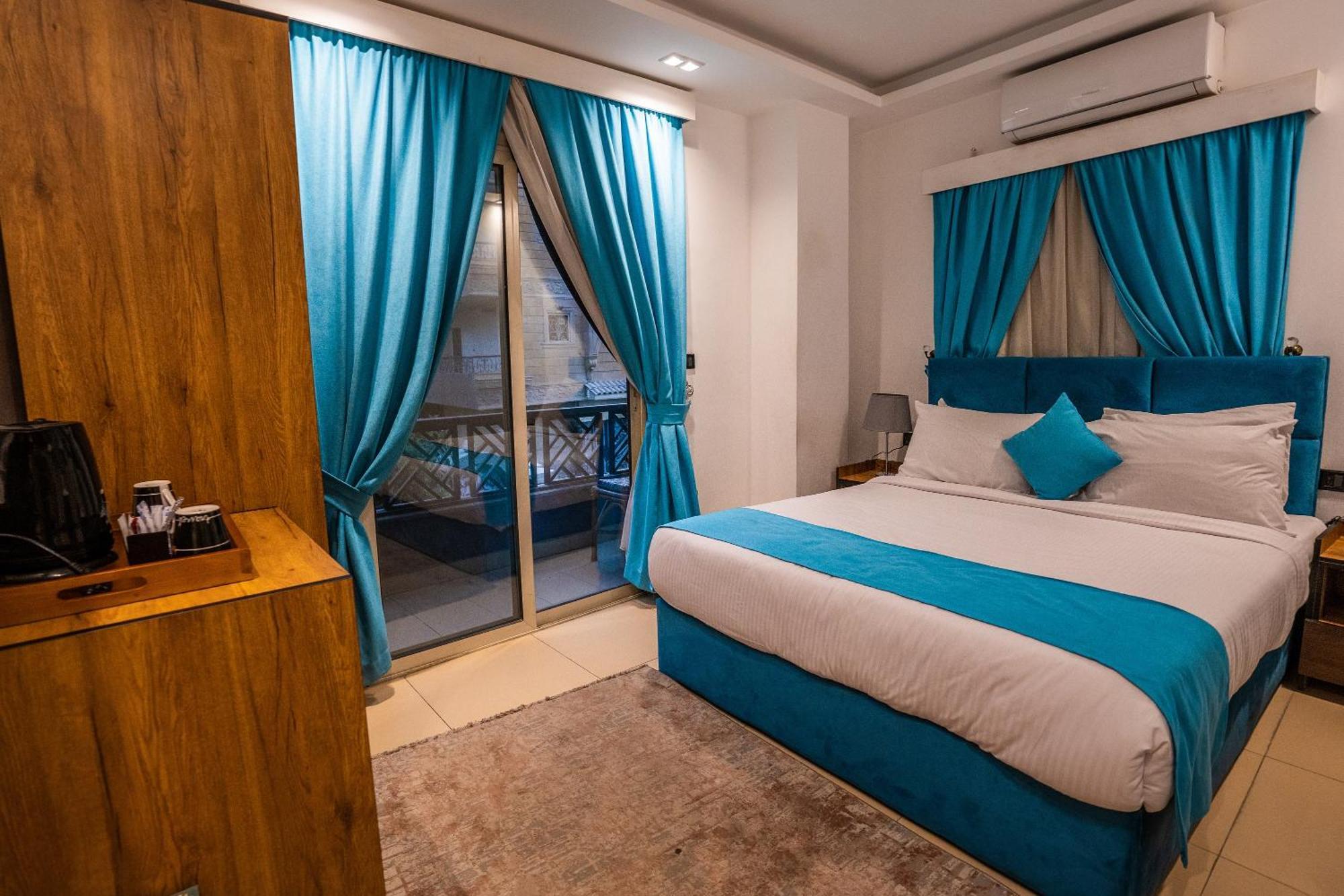 Hotel Pyramids Gem Plaza à Kafret el-Gabal Extérieur photo
